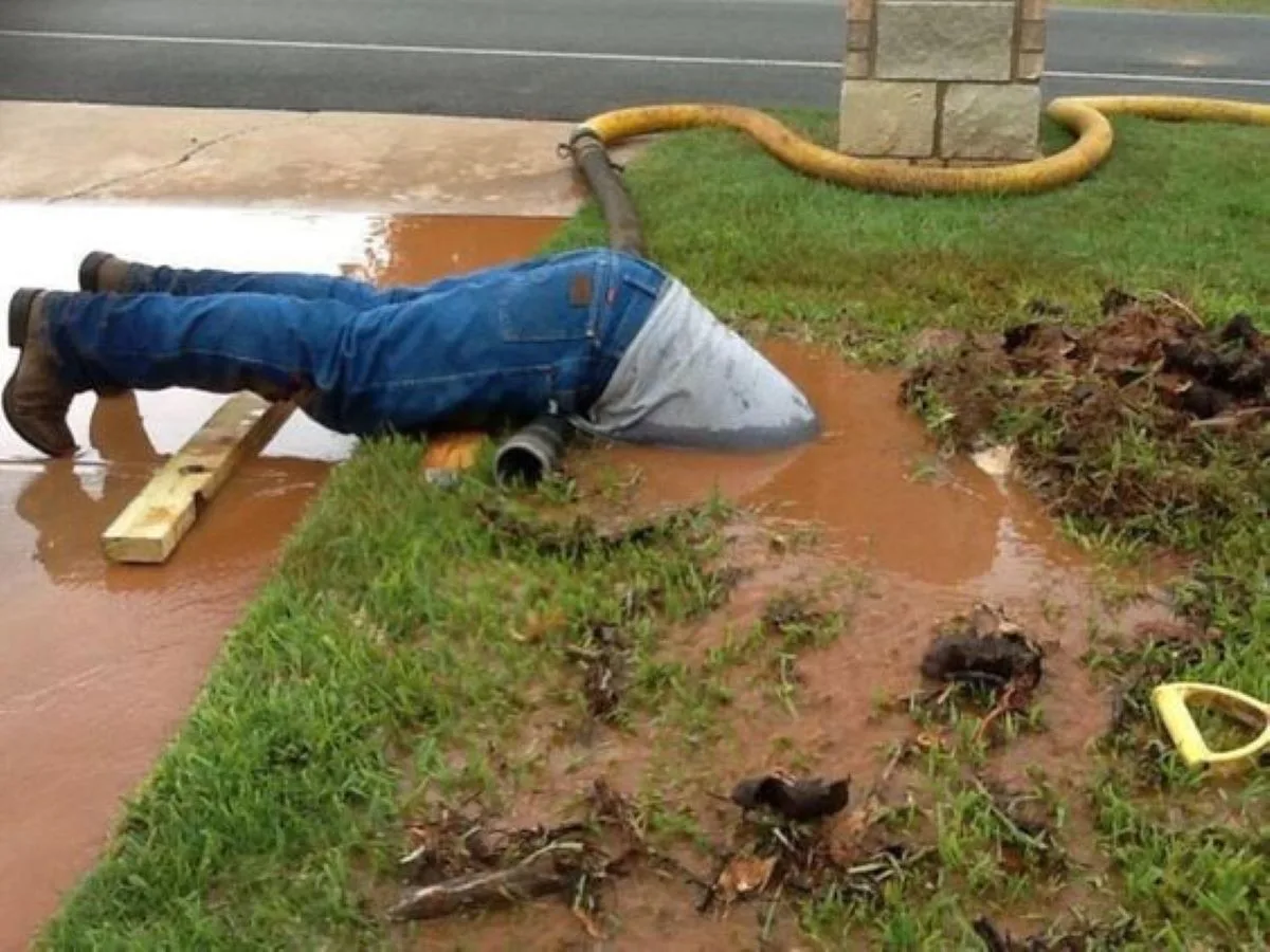 Plumber Dives Head First Into Muddy Hole & Internet Goes Wild.