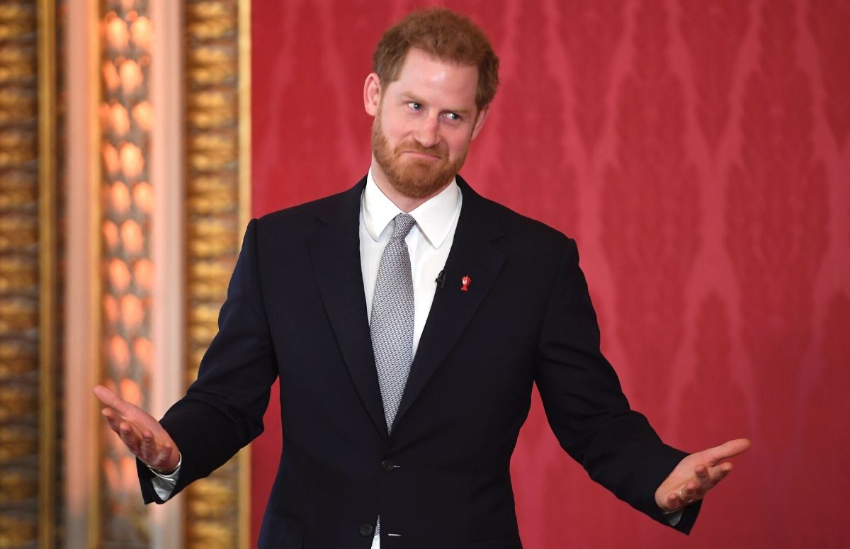 Prince Harry wearing a black suit while hosting the Rugby League World Cup 2021 Draws
