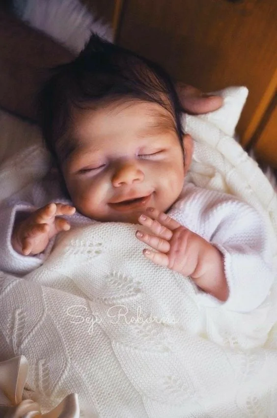Ever-smiling little angels: Their infectious grins persist even in slumber